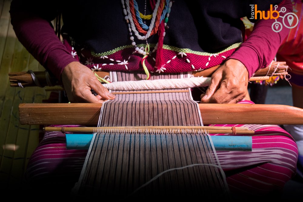 Many Karen ladies keep themselves busy making cloth to sell to the visitors