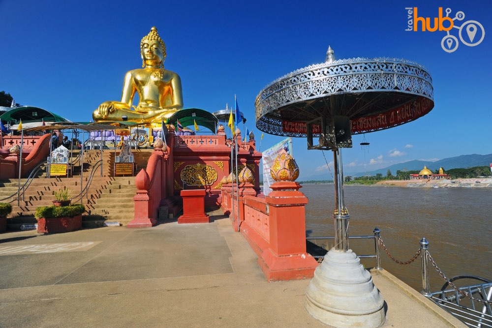The iconic sitting Buddha on the banks of the Mekong River at the Golden Triangle
