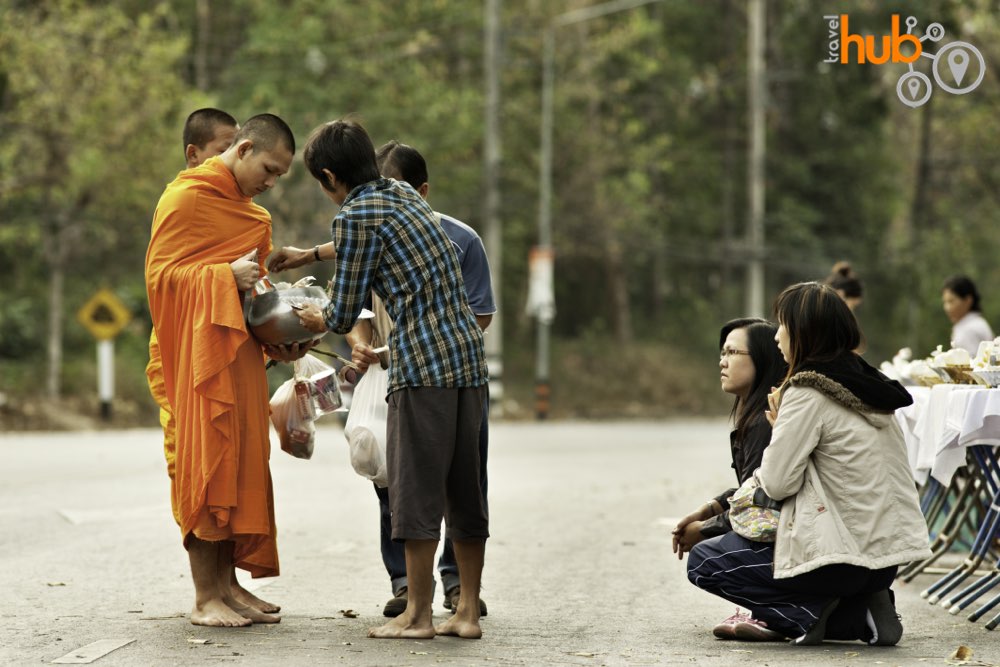 The monks wake early for their alms rounds.......