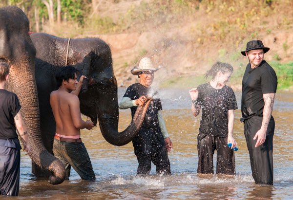 Tour with elephant bathing